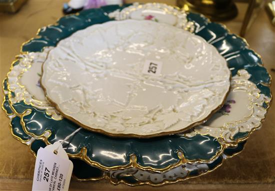 Pair of late Meissen botanical cabinet plates and another Meissen plate with vineous moulding